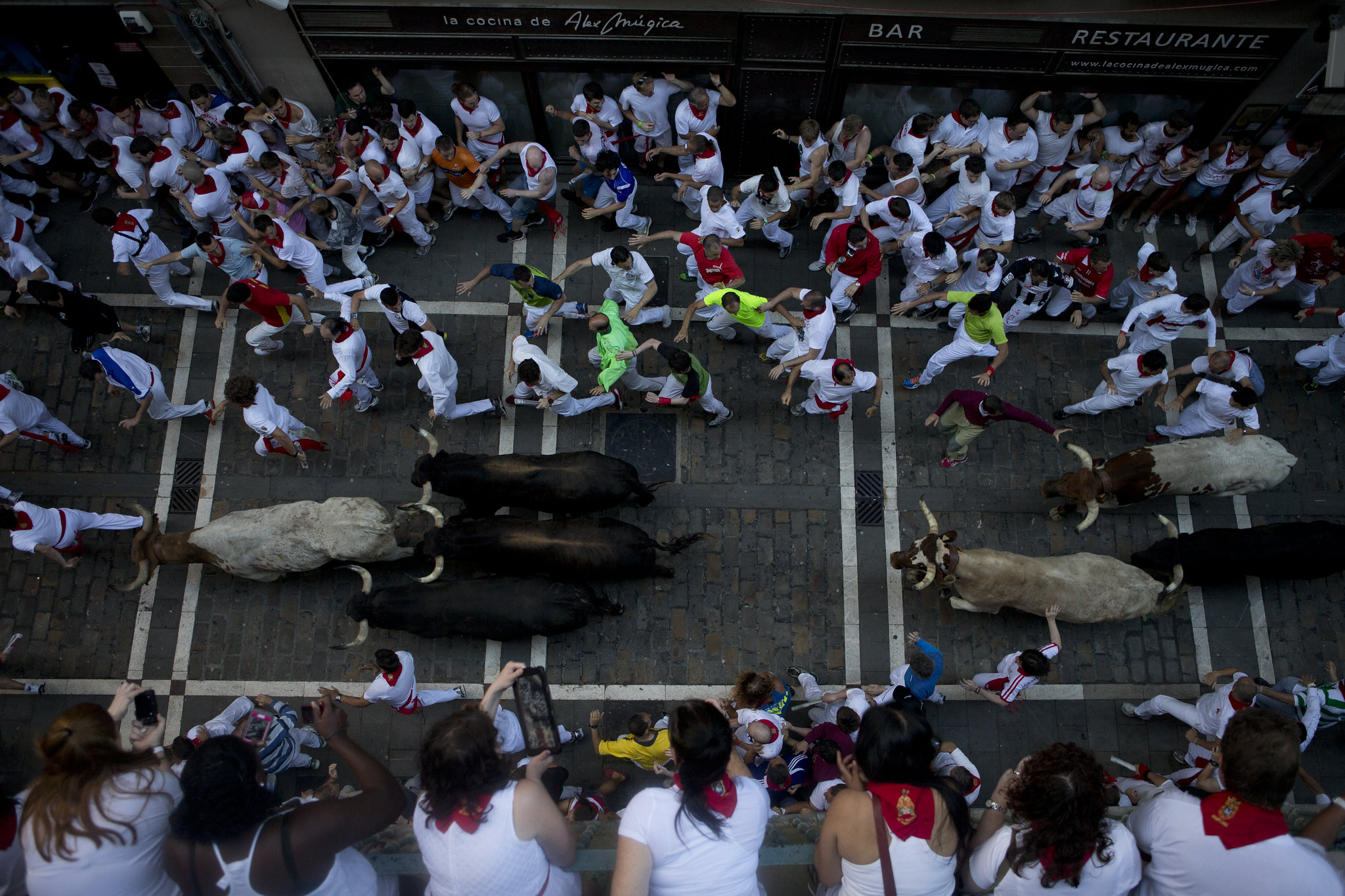 20 Most Unique Villages in Europe Known for Their Local Festivals 4 Tammy Hineline San Fermin Running of the Bulls Festival in Pamplona Spain